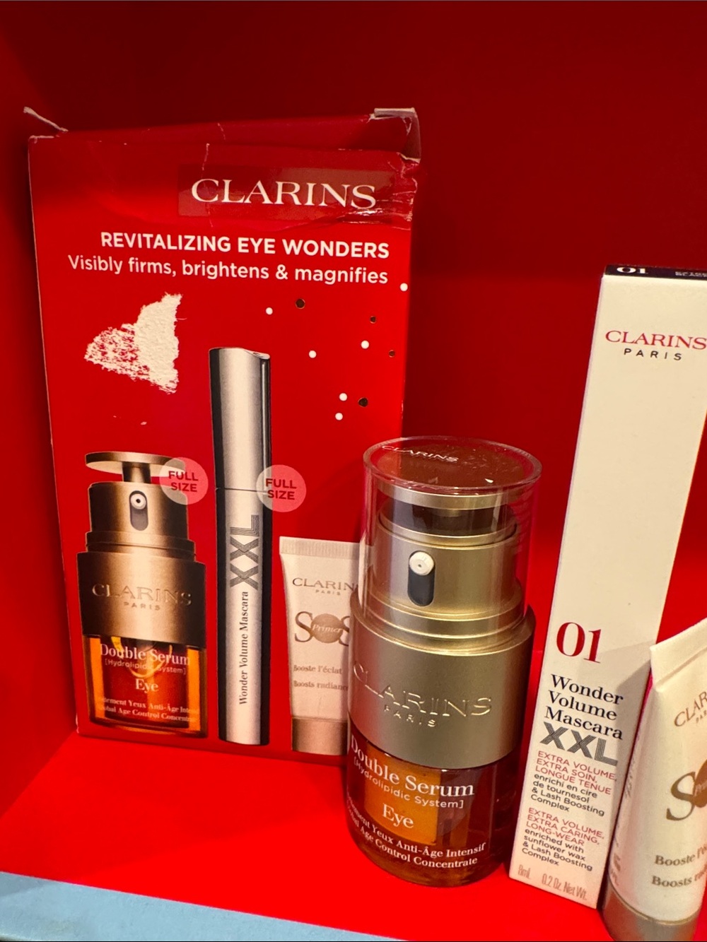 Clarins Revitalizing Eye Serum Duo in Gold and Red